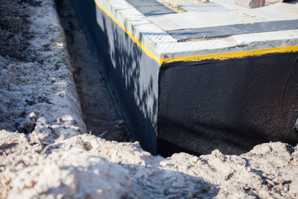 Professional Waterproofing technician working in Oak Park, IL